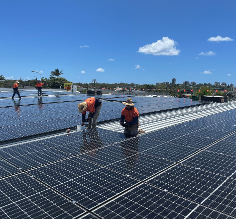 Green and Gold Solar Installer